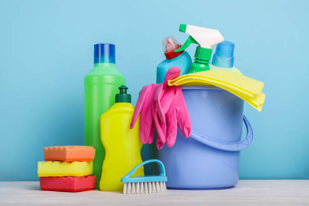 Set of cleaning products on blue background Set of cleaning products on blue background